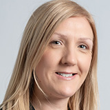 Portrait photograph of staff member, Carolyn Kavanagh